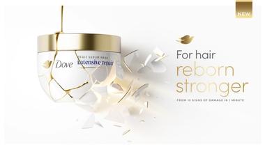 Một hũ mặt nạ tóc Dove Intensive Repair. Văn bản hiển thị: “Tái sinh mái tóc chắc khỏe hơn khỏi 10 dấu hiệu hư tổn chỉ trong 1 phút”.