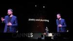 Leandro Barreto trình bày trên sân khấu Cannes Lions 2026, phía sau là màn hình với dòng chữ “Poetry and Plumbing”